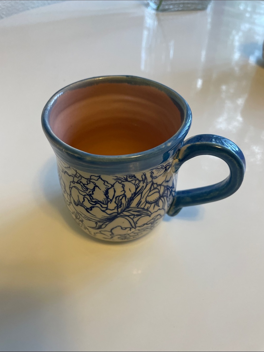 Hand-Painted Floral Ceramic Mug in Blue and Terracotta
